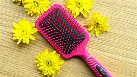 The Pros and Cons of Using a Tangle Matic Brush on Dry Hair